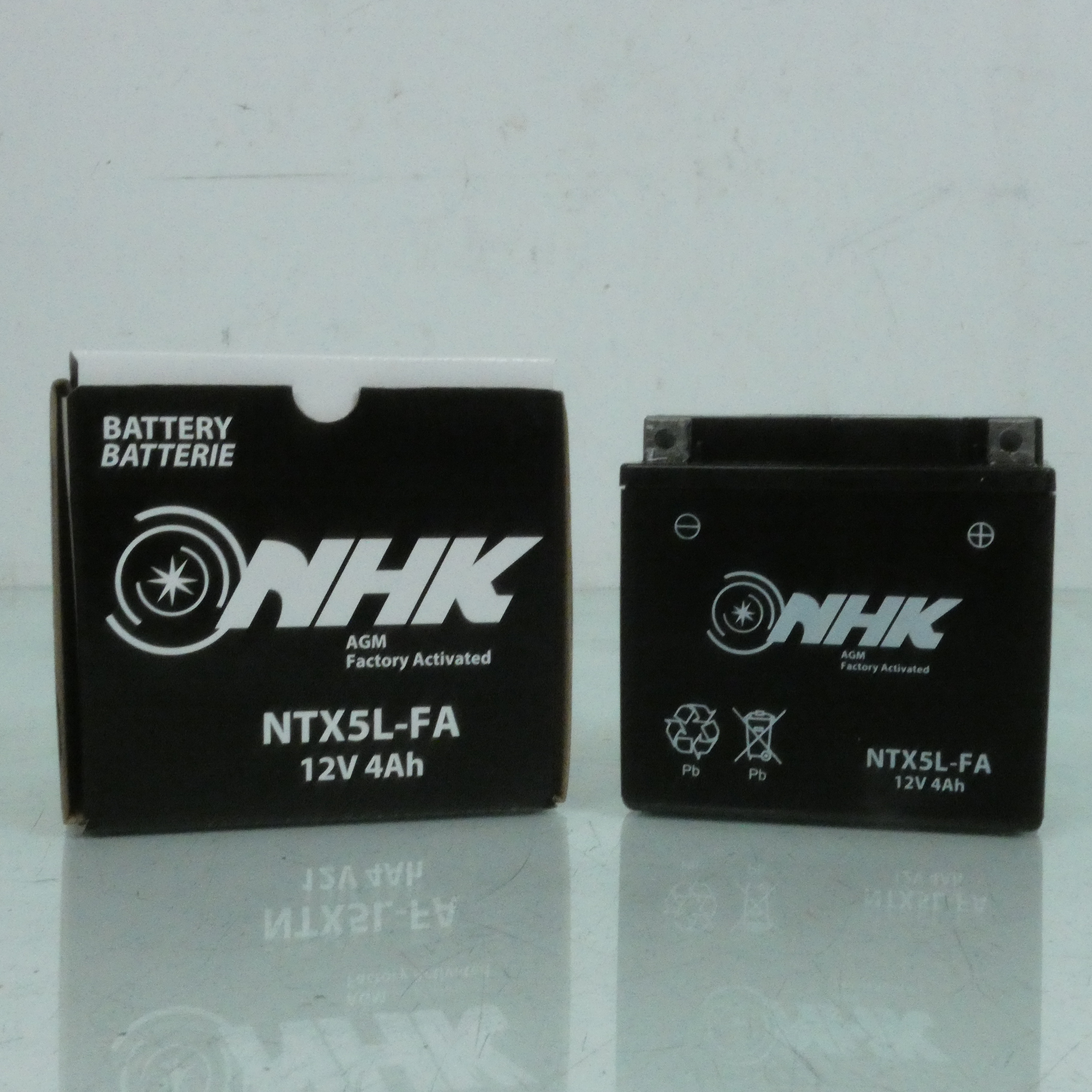 photo piece : Batterie->Suzuki SMX