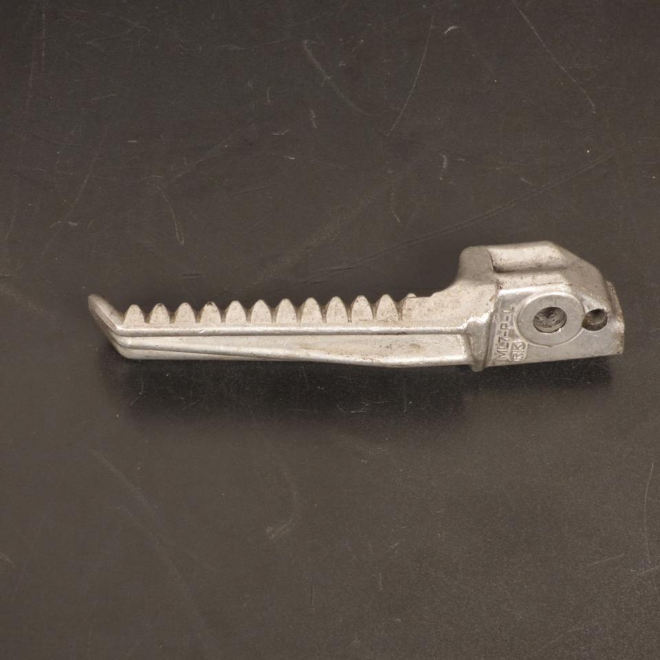 Cale pied passager gauche origine pour moto fixation 21mm Ø8mm Occasion