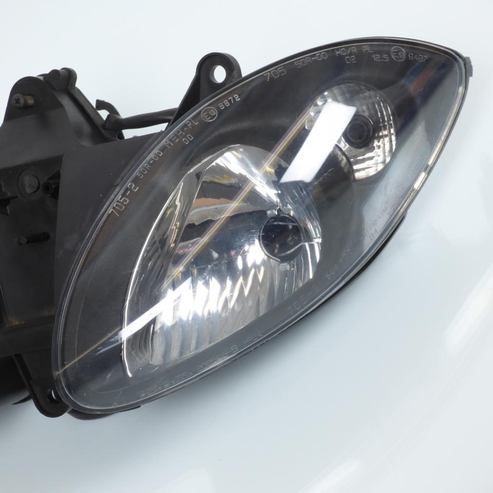 Optique avant origine pour scooter Piaggio 125 X9 2001 310269 Occasion