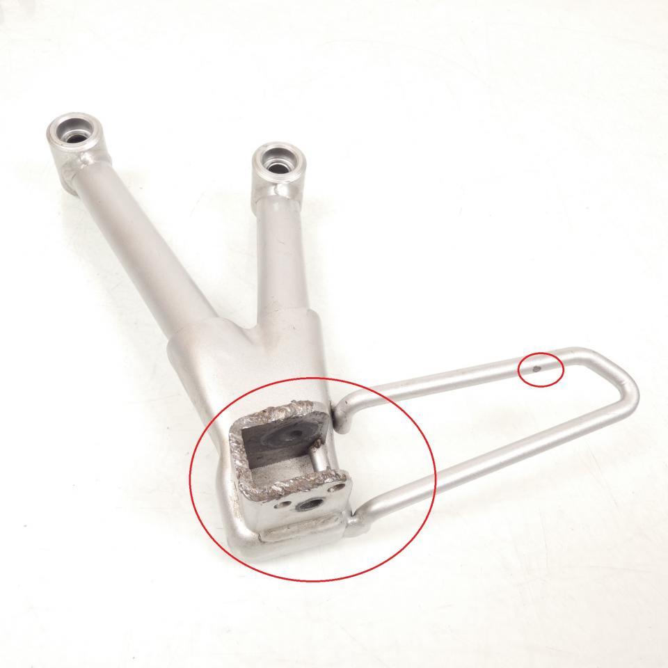 photo piece : Platine de repose pied passager gauche->Suzuki Bandit