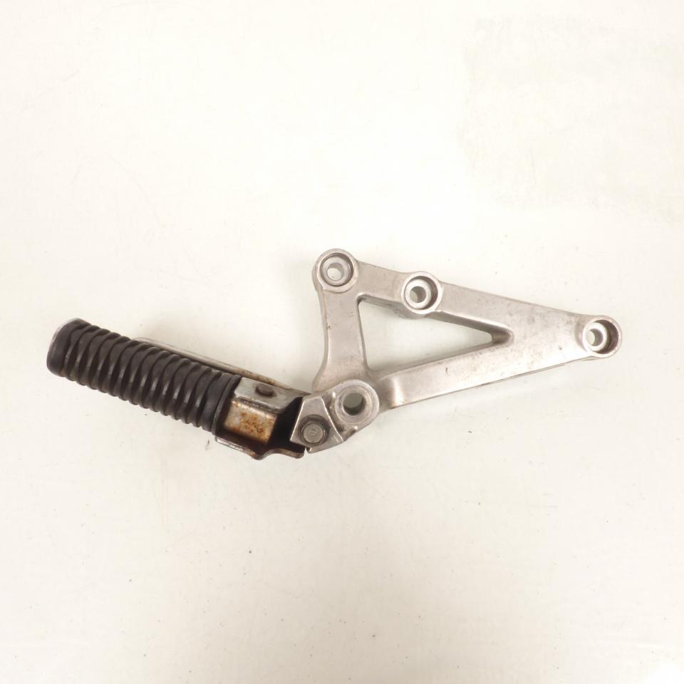 photo piece : Platine de repose pied passager droit->Honda CX