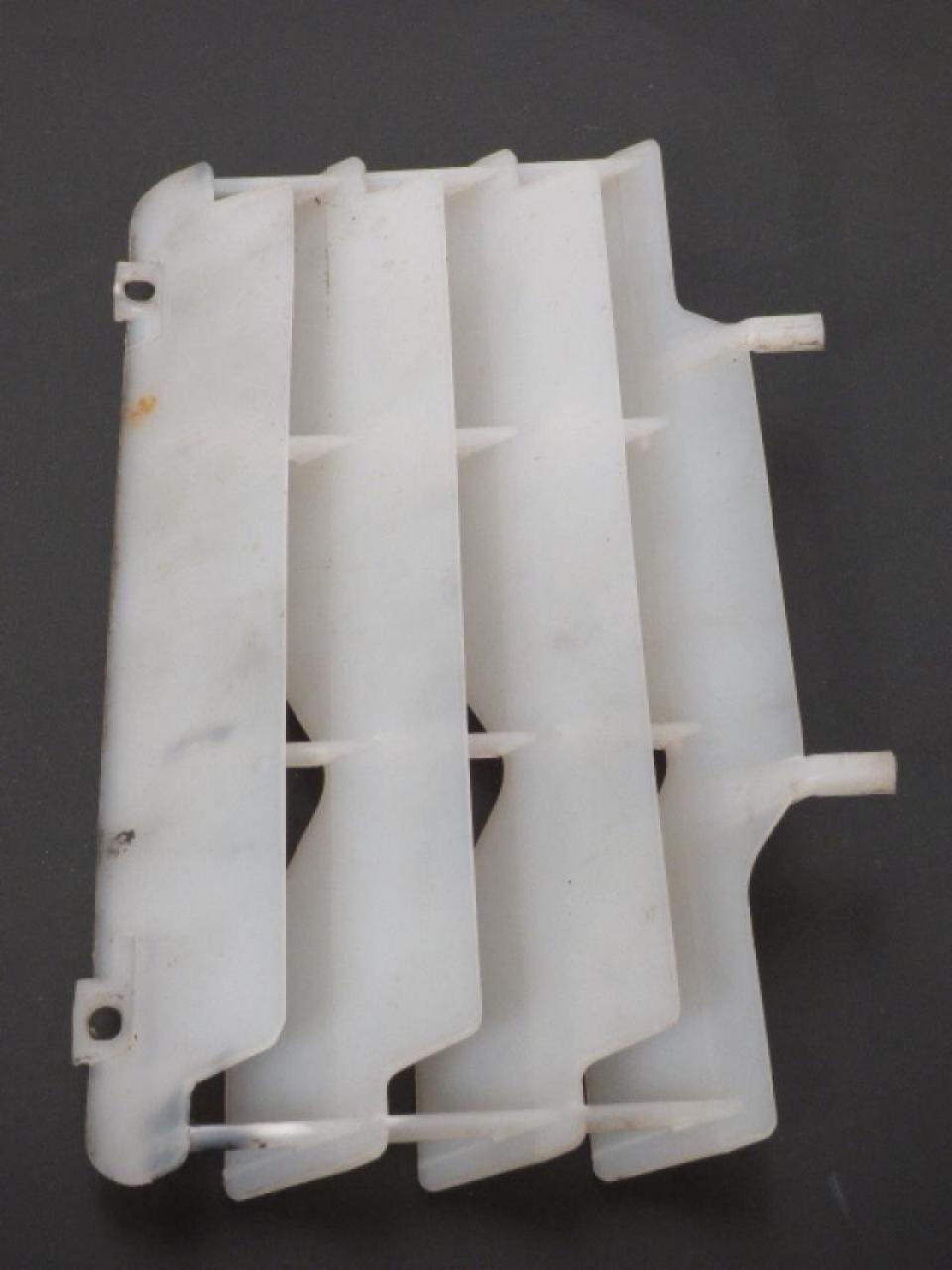 Protection de radiateur origine pour Auto Occasion