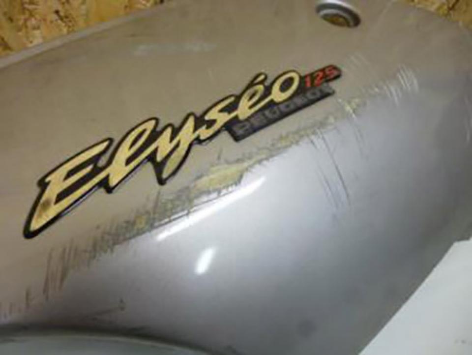 Coque arrière gauche origine pour scooter Peugeot 125 Elyseo 2000 1173807100 Occasion